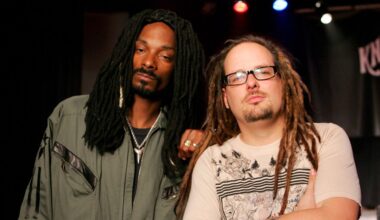 Jonathan Davis and Snoop looking at the camera with serious expressions