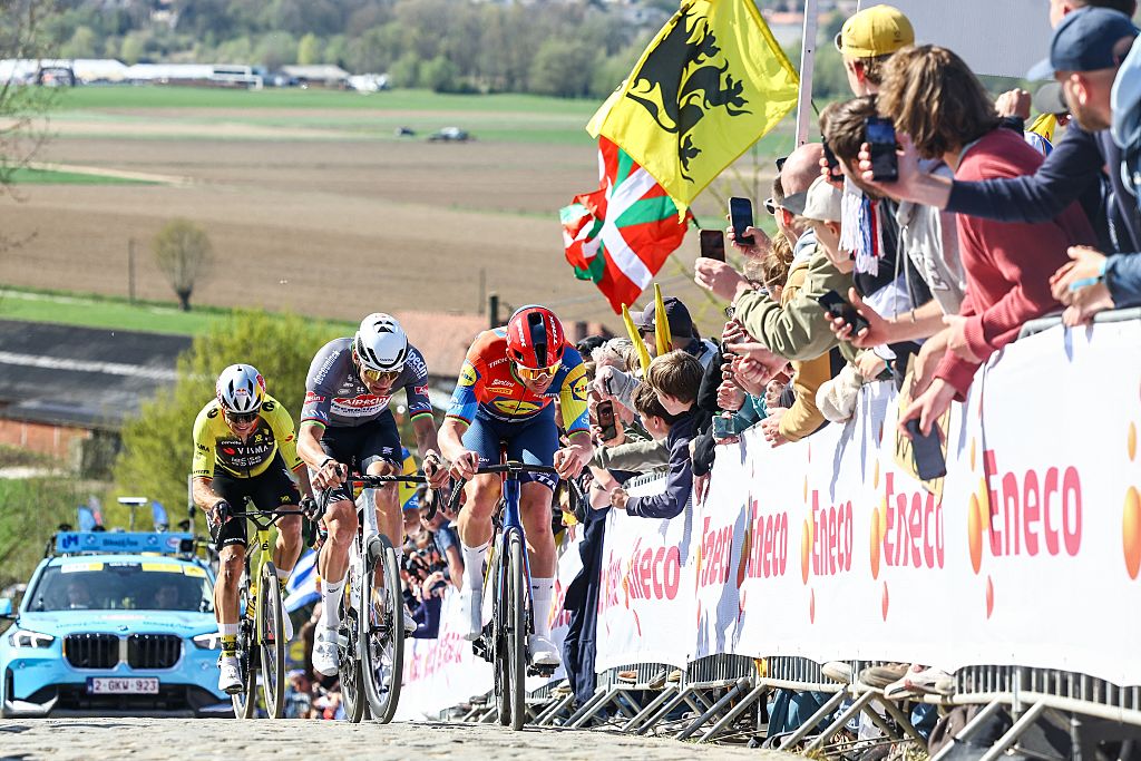 Belgian Wout van Aert of Team Visma-Lease a Bike, Dutch Mathieu van der Poel of Alpecin-Deceuninck and Danish Mads Pedersen of Lidl-Trek pictured at the Paterberg during the men's race of the 'Ronde van Vlaanderen/ Tour des Flandres/ Tour of Flanders' one day cycling race, 268,9km from Brugge to Oudenaarde, Sunday 06 April 2025. BELGA PHOTO DAVID PINTENS (Photo by DAVID PINTENS / BELGA MAG / Belga via AFP)