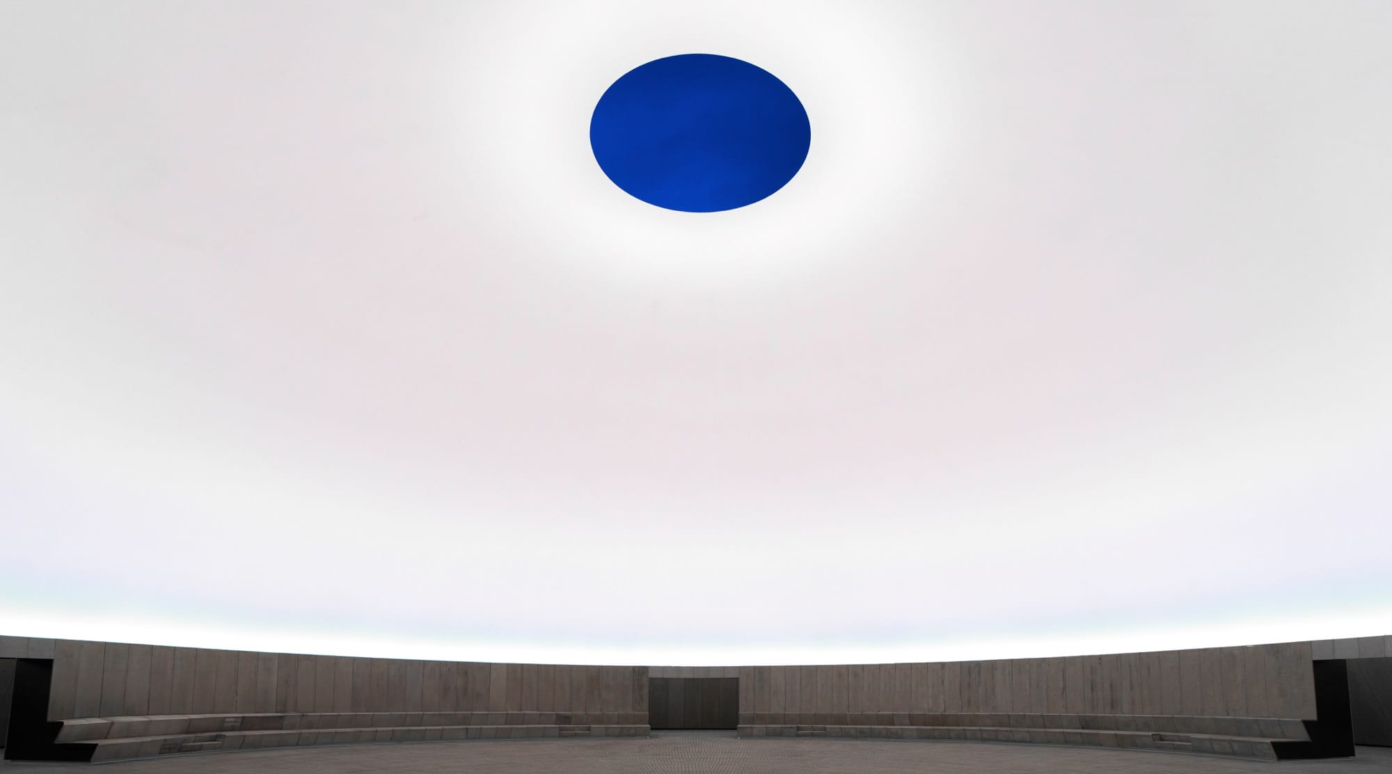An interior view of James Turrell's Aarhus 'Skyspace' artwork at ARoS as it is illuminated bright white
