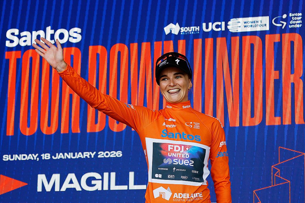 PARACOMBE, AUSTRALIA - JANUARY 18: Ally Wollaston of New Zealand and Team FDJ United - SUEZ celebrates at podium as Orange Santos Leader&amp;apos;s Jersey winner during the 10th Santos Women&amp;apos;s Tour Down Under 2026, Stage 2 a 130.7km stage from Magill to Paracombe 410m / #UCIWWT / on January 18, 2026 in Paracombe, Australia. (Photo by Con Chronis/Getty Images)