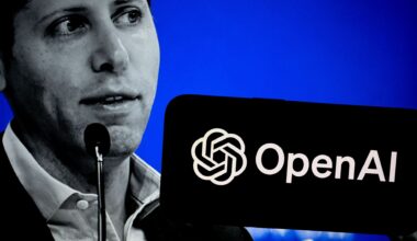 A black and white photo of Sam Altman, CEO at OpenAI, on a blue background with a phone bearing the OpenAI logo held in the foreground.