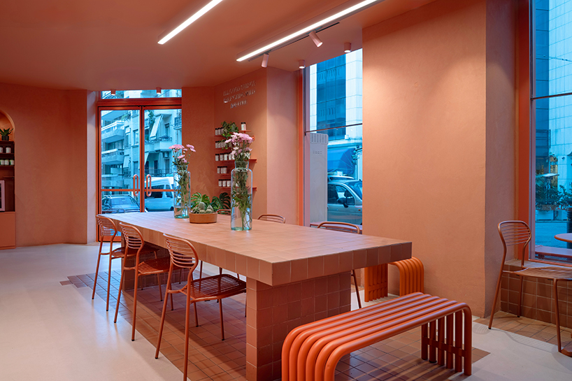 terracotta tiles clad wild souls clean-eating venue’s exterior by studiomateriality in athens