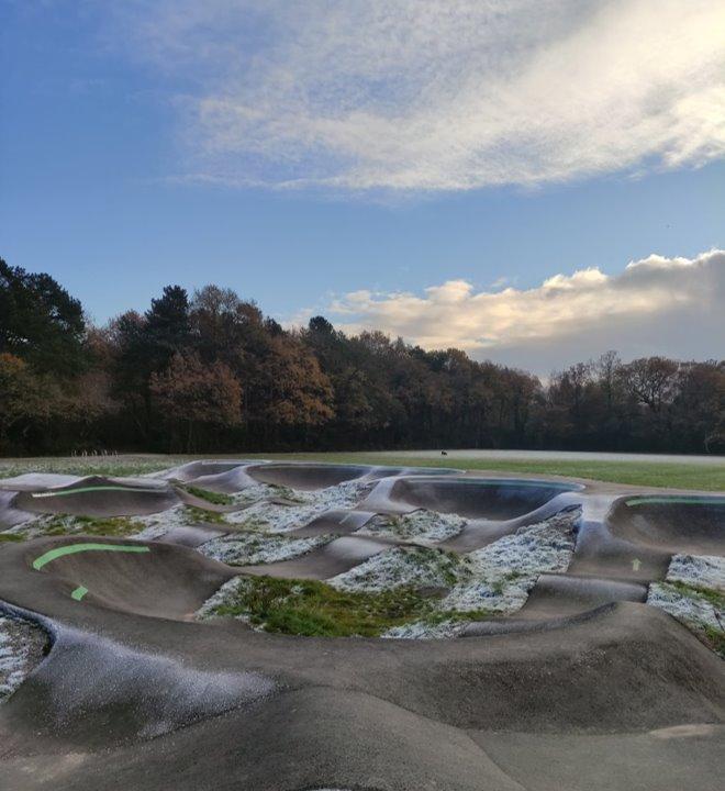 Wythenshawe Park, Places to Ride - A dirt track with trees in the background