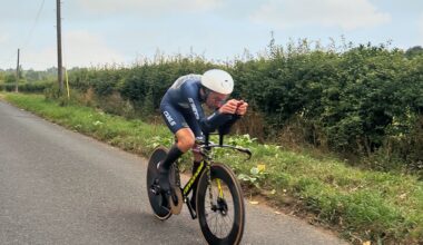 Action shot of author Aaron Borrill riding the Scribe Tempus Disc/100 wheelset in a time trial race