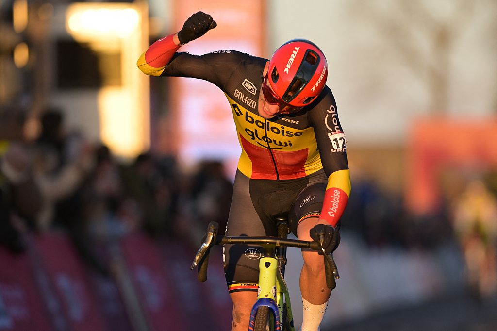 Belgian Thibau Nys celebrates as he crosses the finish line to win the men's elite race at the World Cup cyclocross cycling event in Dendermonde, Belgium, stage 8 (out of 12) of the UCI World Cup cyclocross competition, Sunday 28 December 2025.BELGA PHOTO DAVID PINTENS (Photo by DAVID PINTENS / BELGA MAG / Belga via AFP)