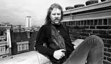 James Hetfield shot on a rooftop in London in black and white, looking serious