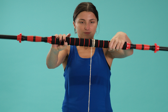 A person using a wrist roller.