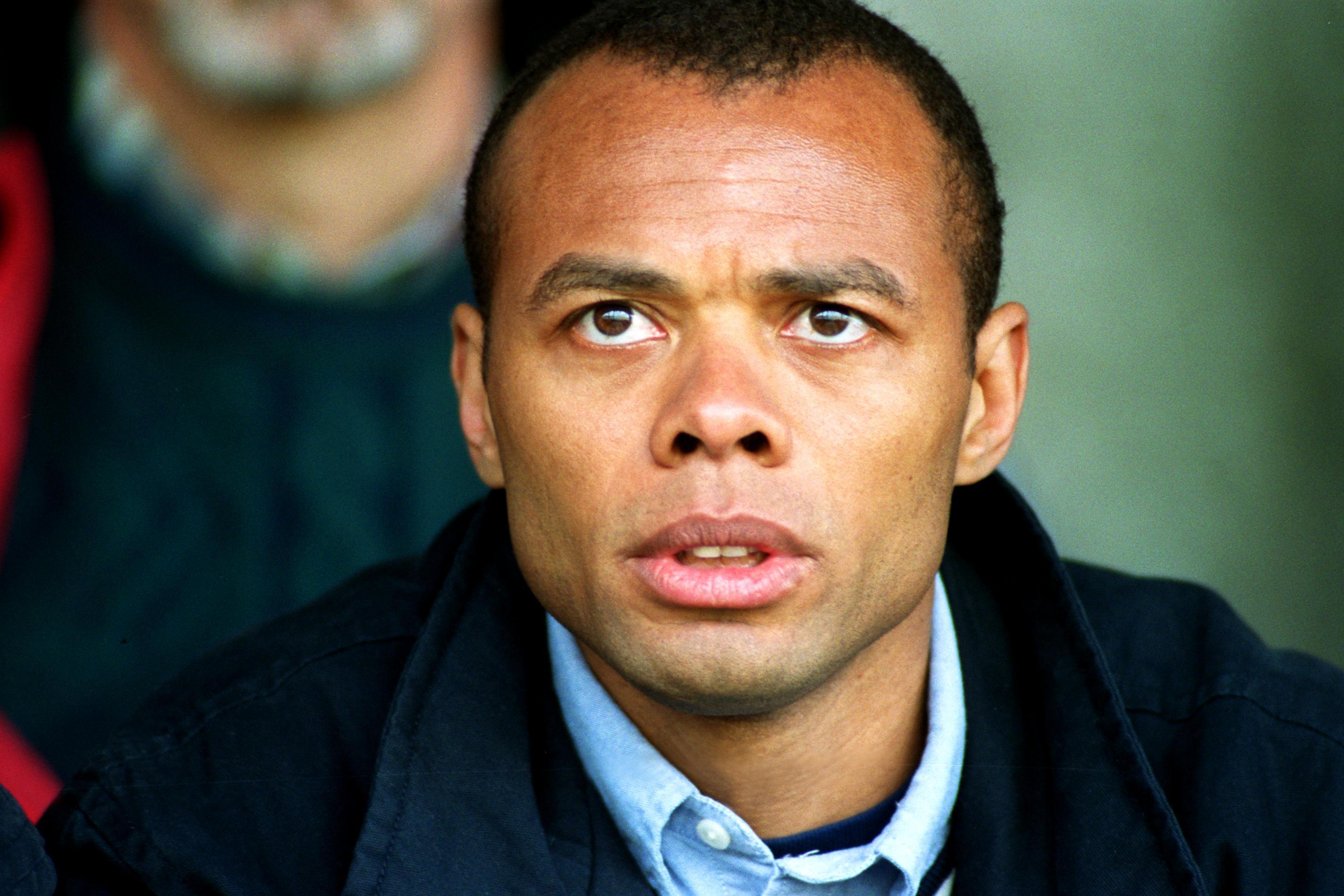 Headshot of England Rugby coach Andrew Harriman looking slightly upwards.