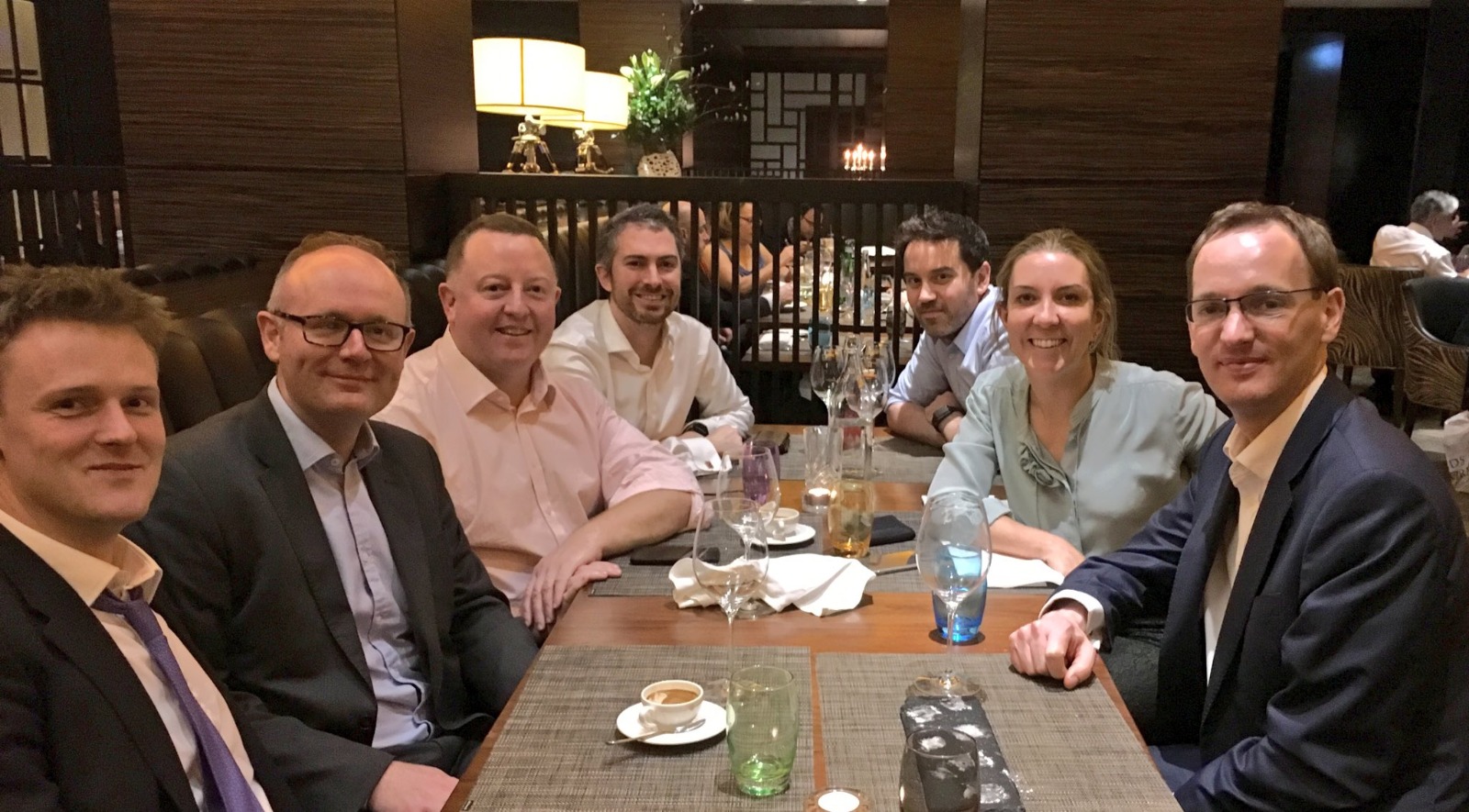 Antonia Romeo and Darren Tierney with four other people at a dinner table.