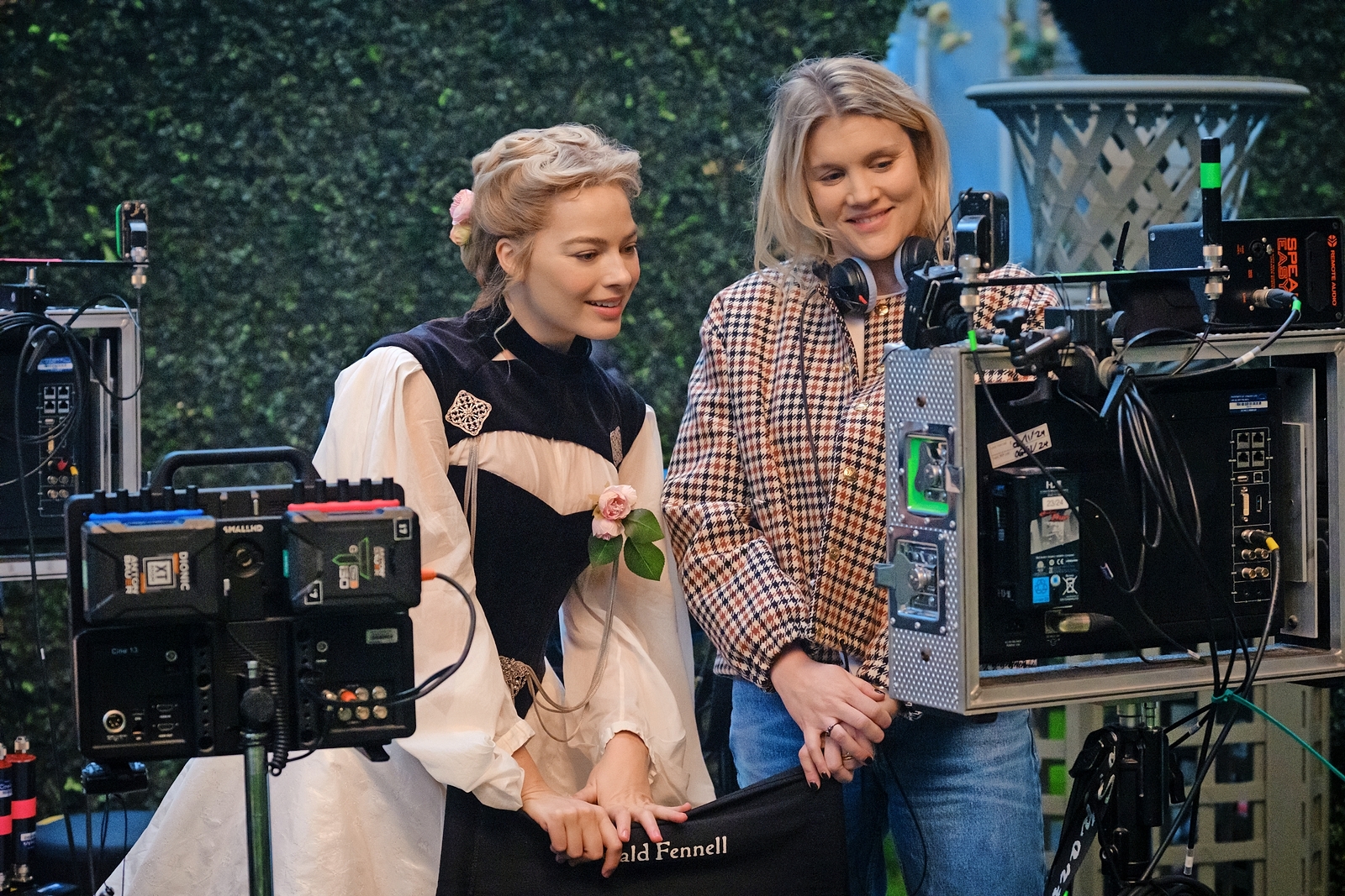 Margot Robbie and Emerald Fennell on the set of "Wuthering Heights."