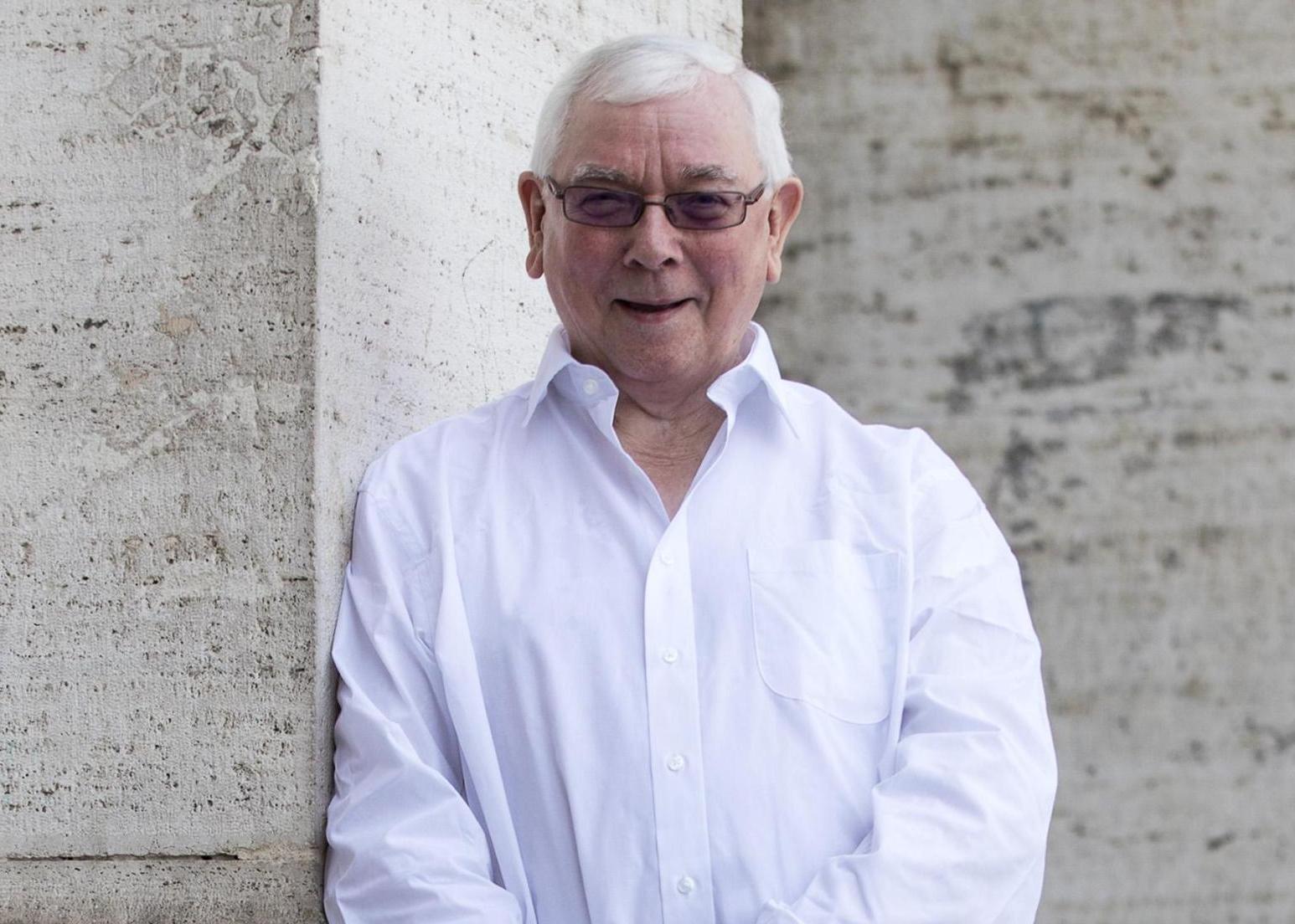 Terence Davies, director of "A Quiet Passion", posing for photographs in Rome.