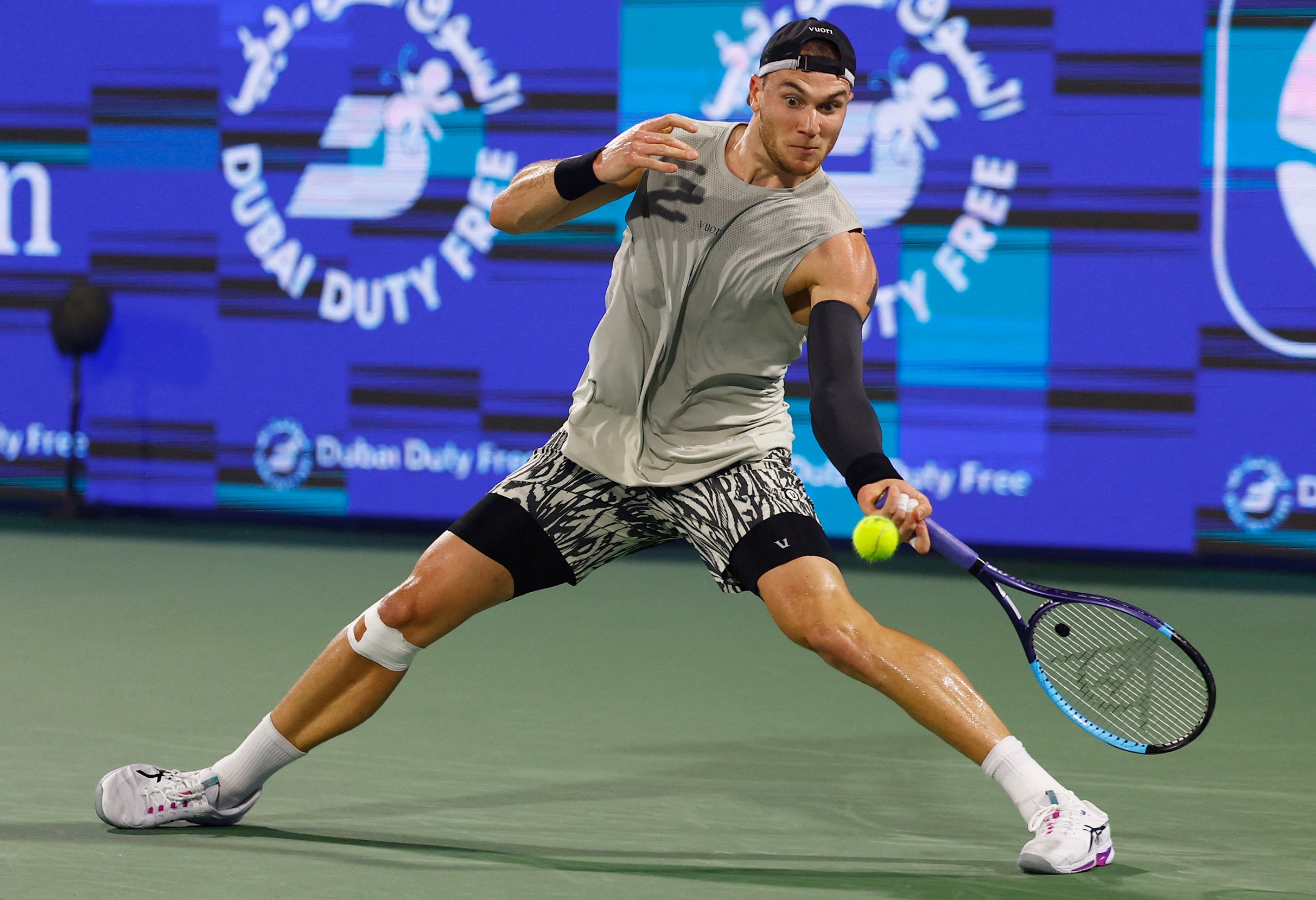 Britain's Jack Draper in action during his round of 32 match against France's Quentin Halys at the ATP 500 Dubai Championships.