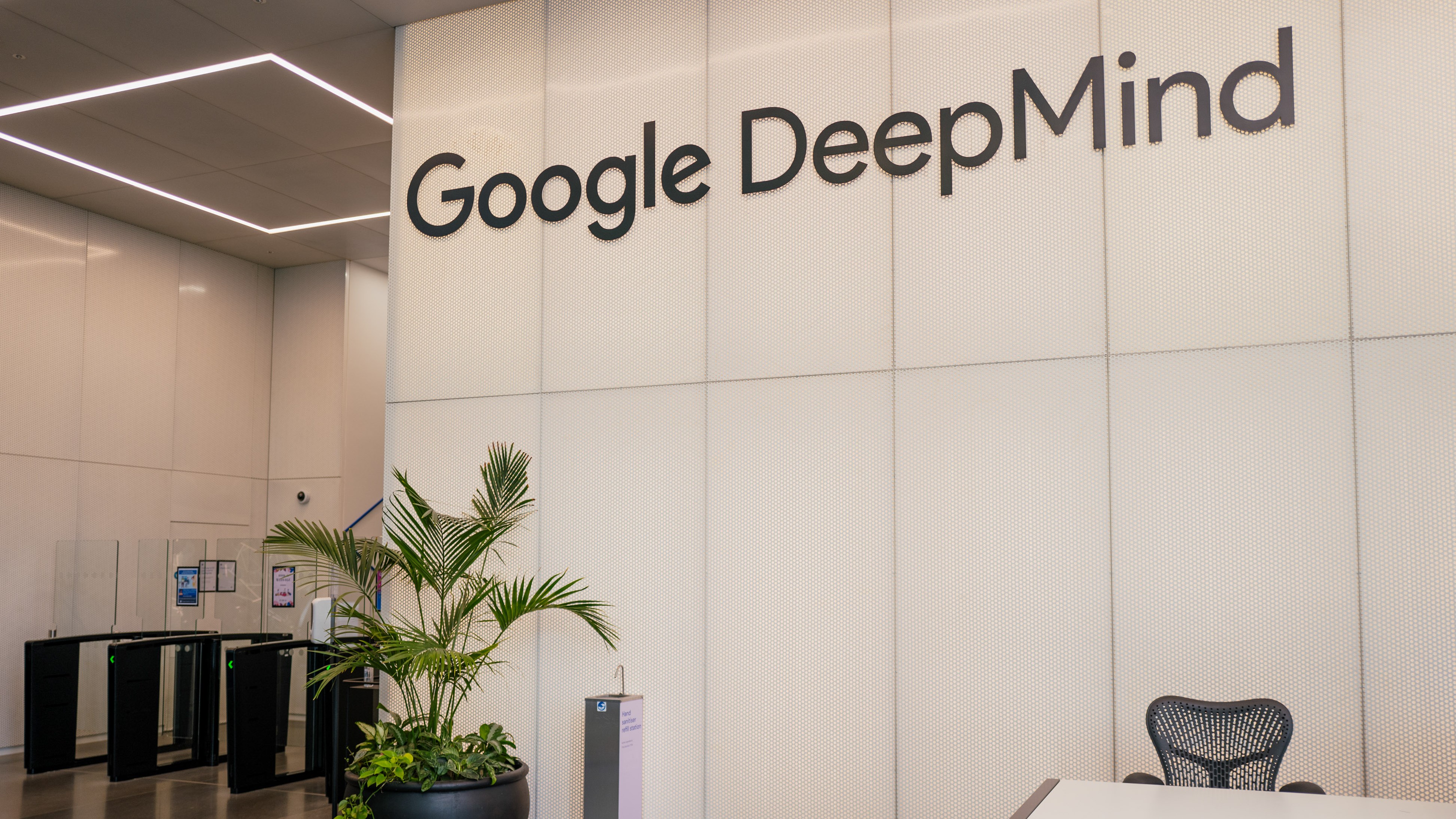 A sign reading "Google DeepMind" in the reception area of the company's London headquarters.