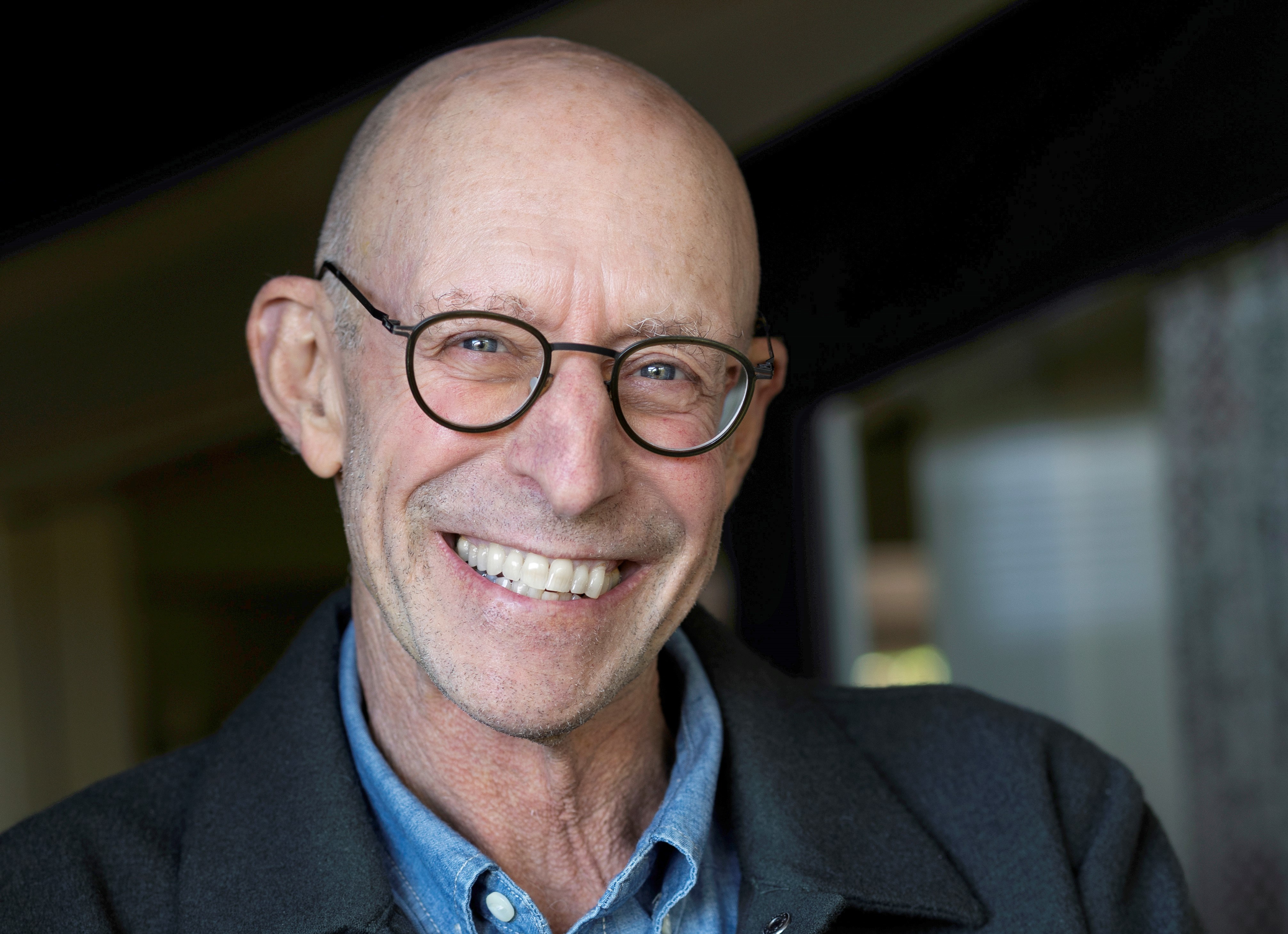 Headshot of Michael Pollan smiling.