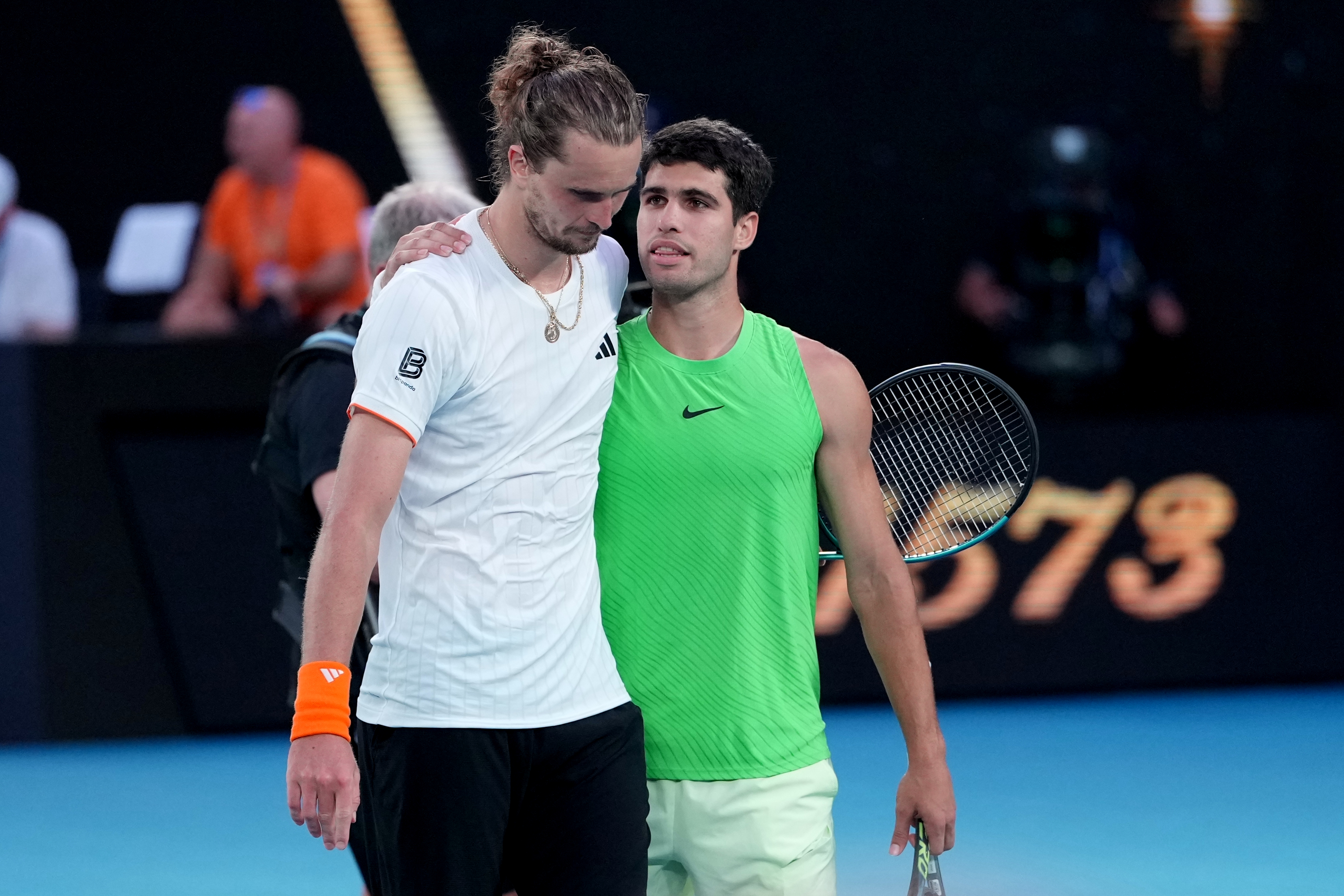 Carlos Alcaraz congratulates Alexander Zverev after their Australian Open semifinal match.
