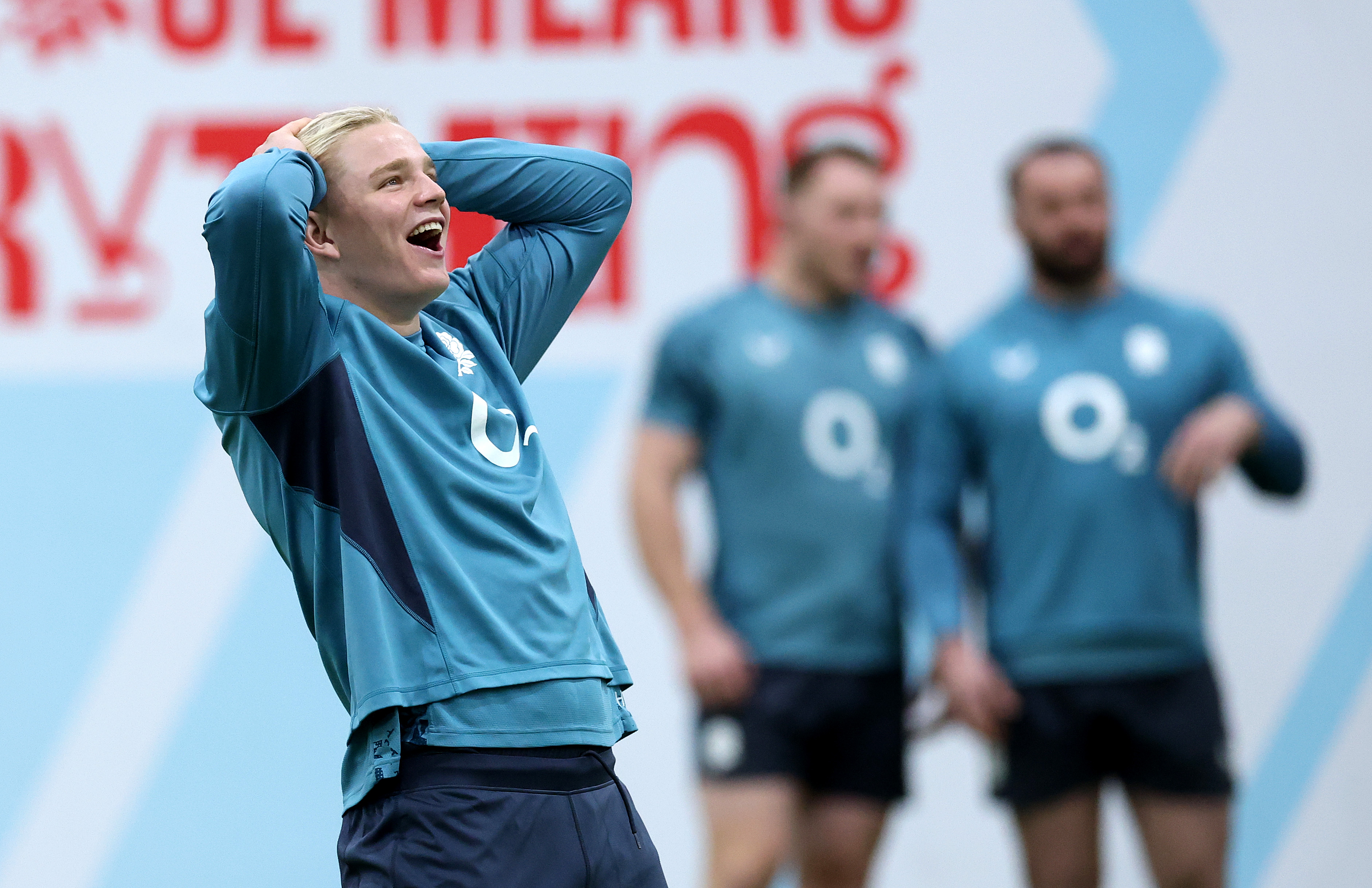 Henry Pollock laughing at an England rugby training session.
