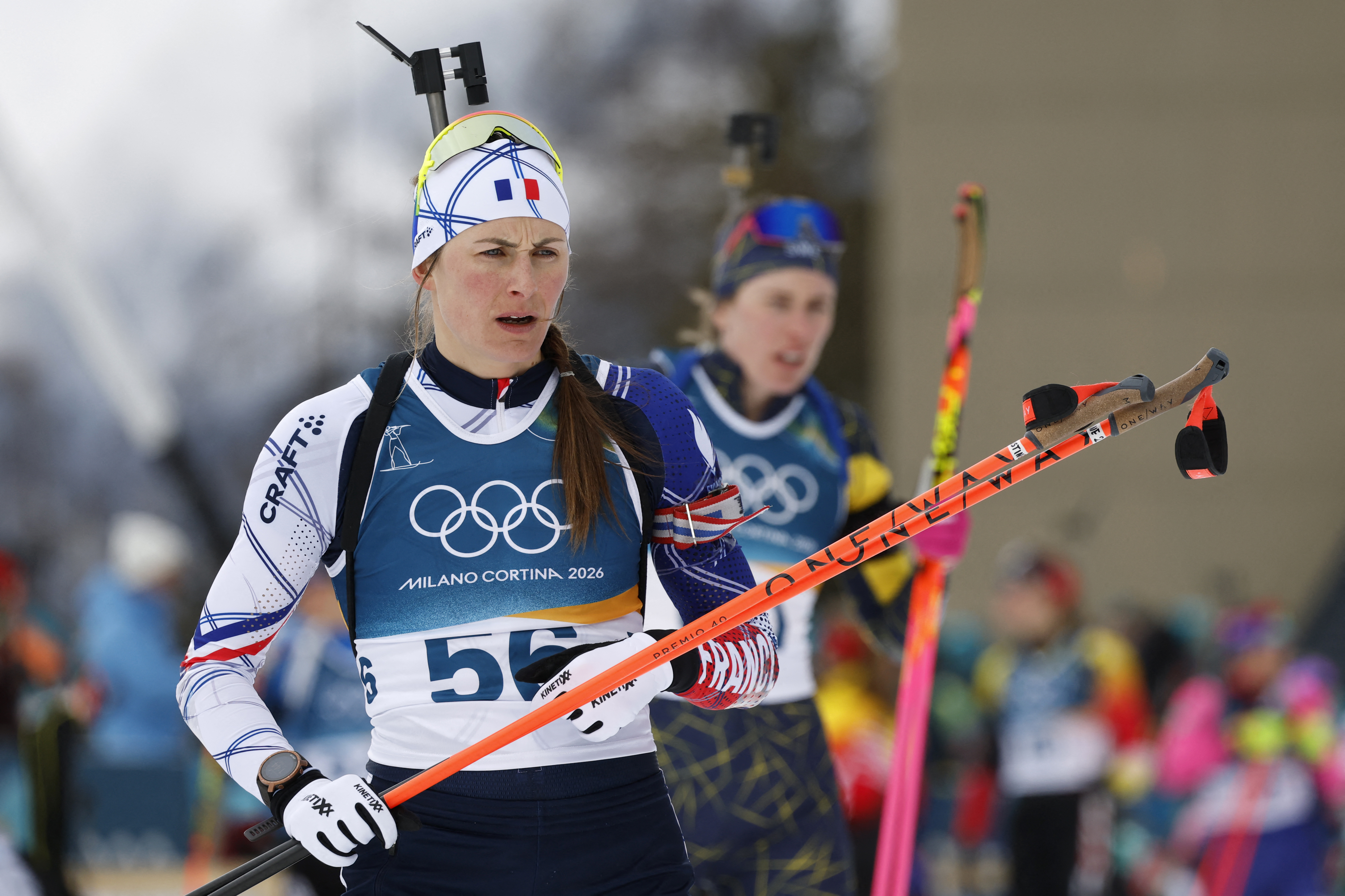 France's Justine Braisaz-Bouchet warms up before the women's biathlon 15km individual event at the Milano Cortina 2026 Winter Olympic Games.