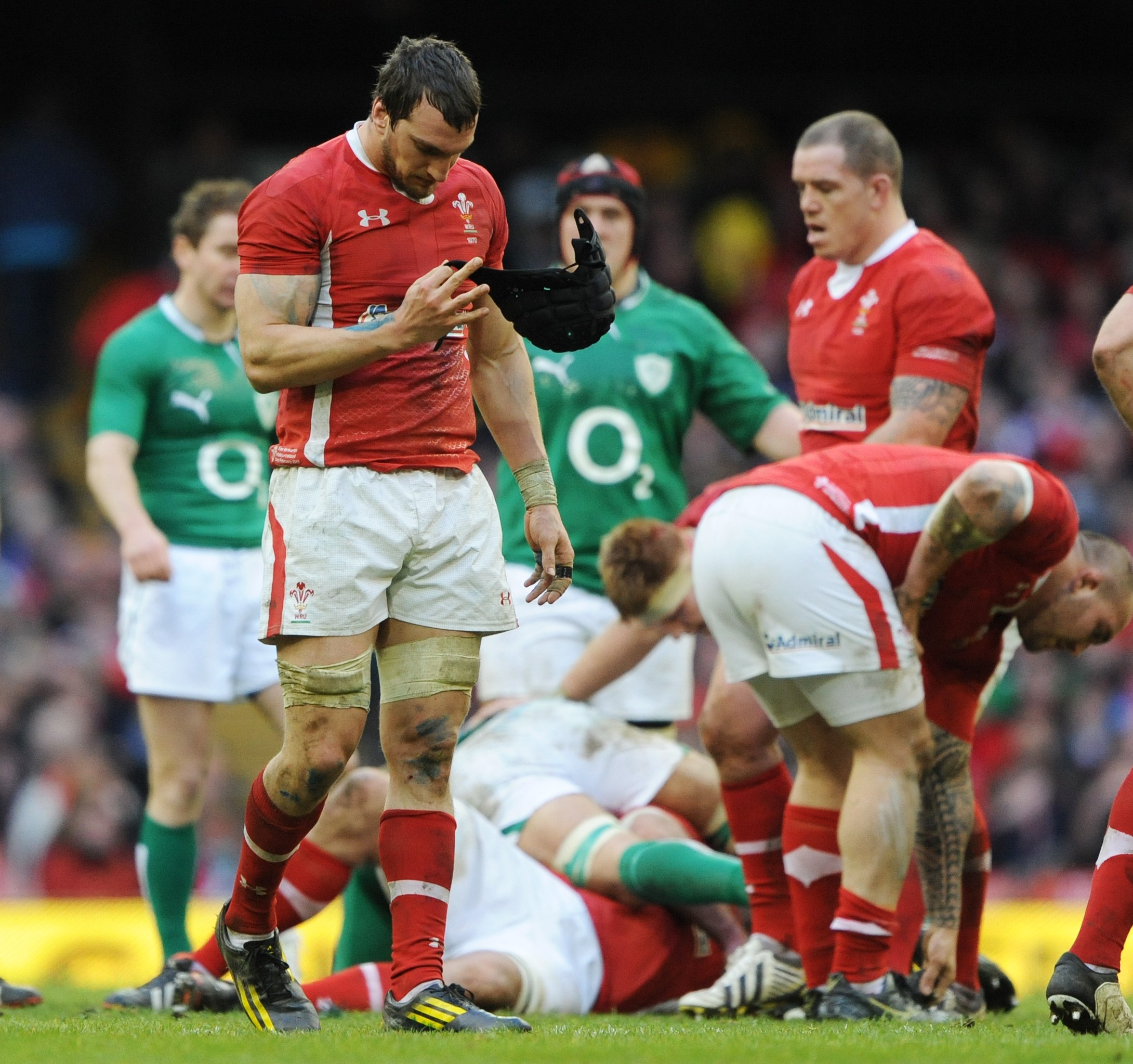 Sam Warburton of Wales looks dejected after the final whistle of a rugby match.