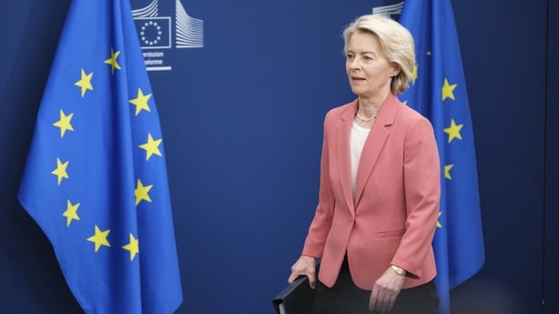 President of the European Commission Ursula von der Leyen walking to the podium at the EU Commission headquarter.