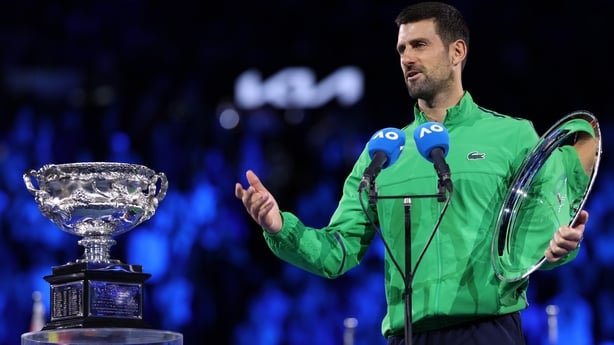MELBOURNE, AUSTRALIA - FEBRUARY 01: Runner-up Novak Djokovic of Serbia speaks with finalist plaque at the presentation ceremony after the Men's Singles Final against Carlos Alcaraz of Spain during day 15 of the 2026 Australian Open at Melbourne Park on February 01, 2026 in Melbourne, Australia. (Pho
