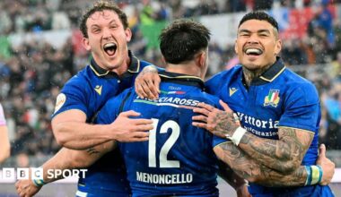 Italy players celebrate beating Scotland