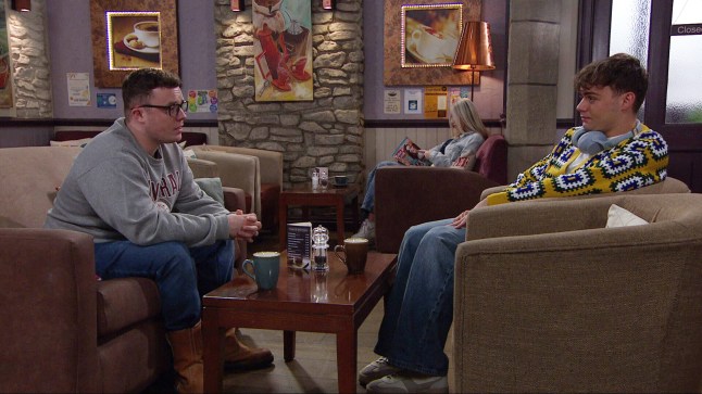 Vinny chats to Lewis in the cafe in Emmerdale