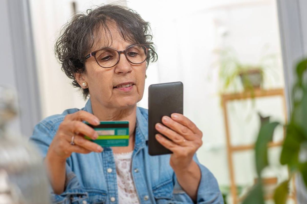A woman checks her finances