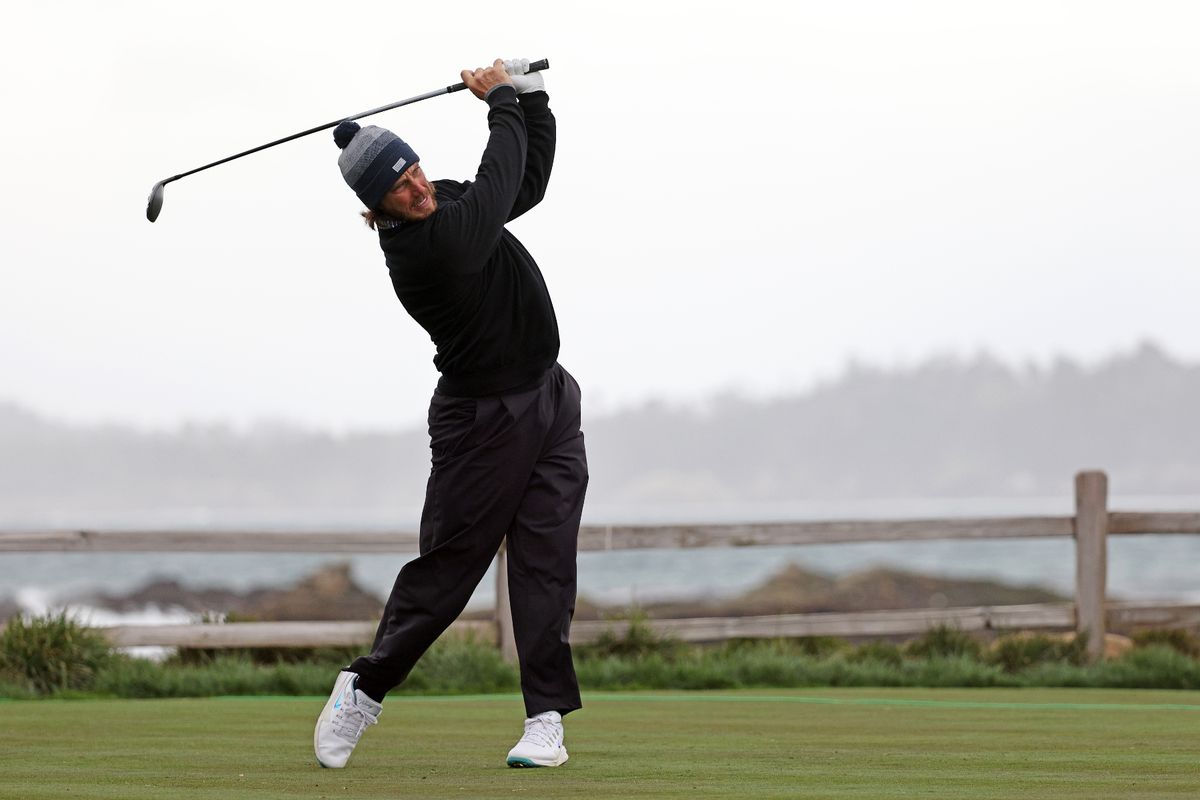 Tommy Fleetwood of England plays his shot from the 18th tee during the final round of the AT&T Pebble Beach Pro-Am 2026 at Pebble Beach Golf Links on February 15, 2026 in Pebble Beach, California.