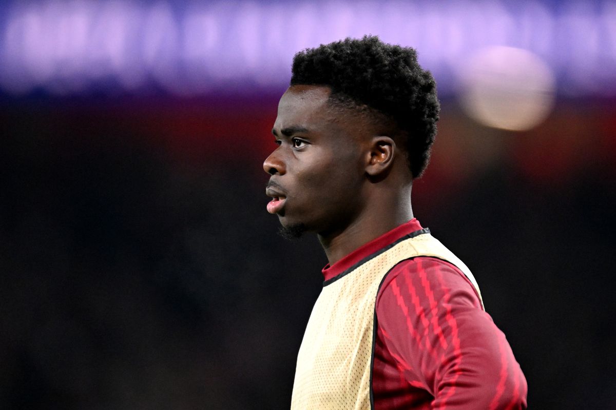 Bukayo Saka of Arsenal looks on