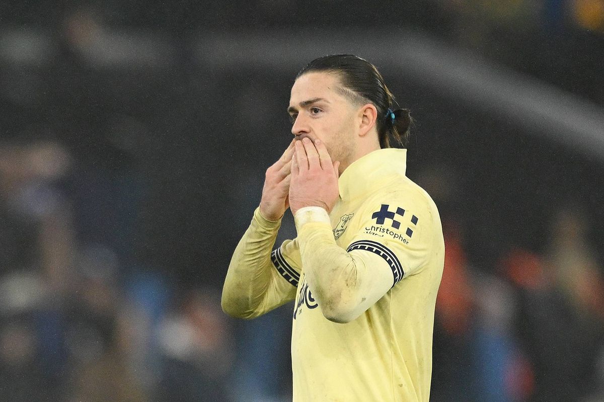 Jack Grealish acknowledges the fans as he celebrates victory after Everton defeat Aston Villa during the Premier League match.