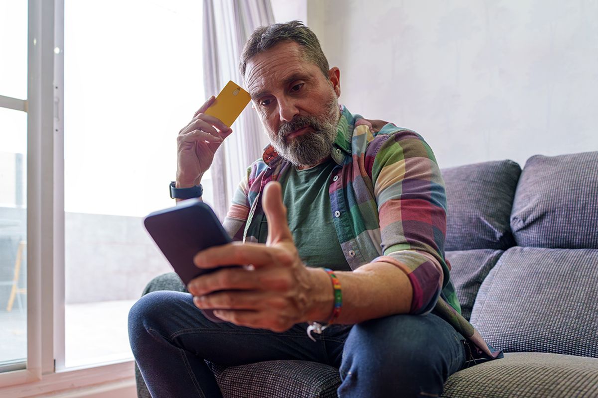 A man checks his finances