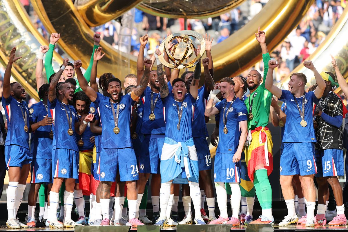 EAST RUTHERFORD, NEW JERSEY - JULY 13: Enzo Fernandez #8 of Chelsea FC lifts the FIFA Club World Cup trophy after his team's victory following the FIFA Club World Cup 2025 Final match between Chelsea FC and Paris Saint-Germain at MetLife Stadium on July 13, 2025 in East Rutherford, New Jersey. (Photo by Hector Vivas - FIFA/FIFA via Getty Images)