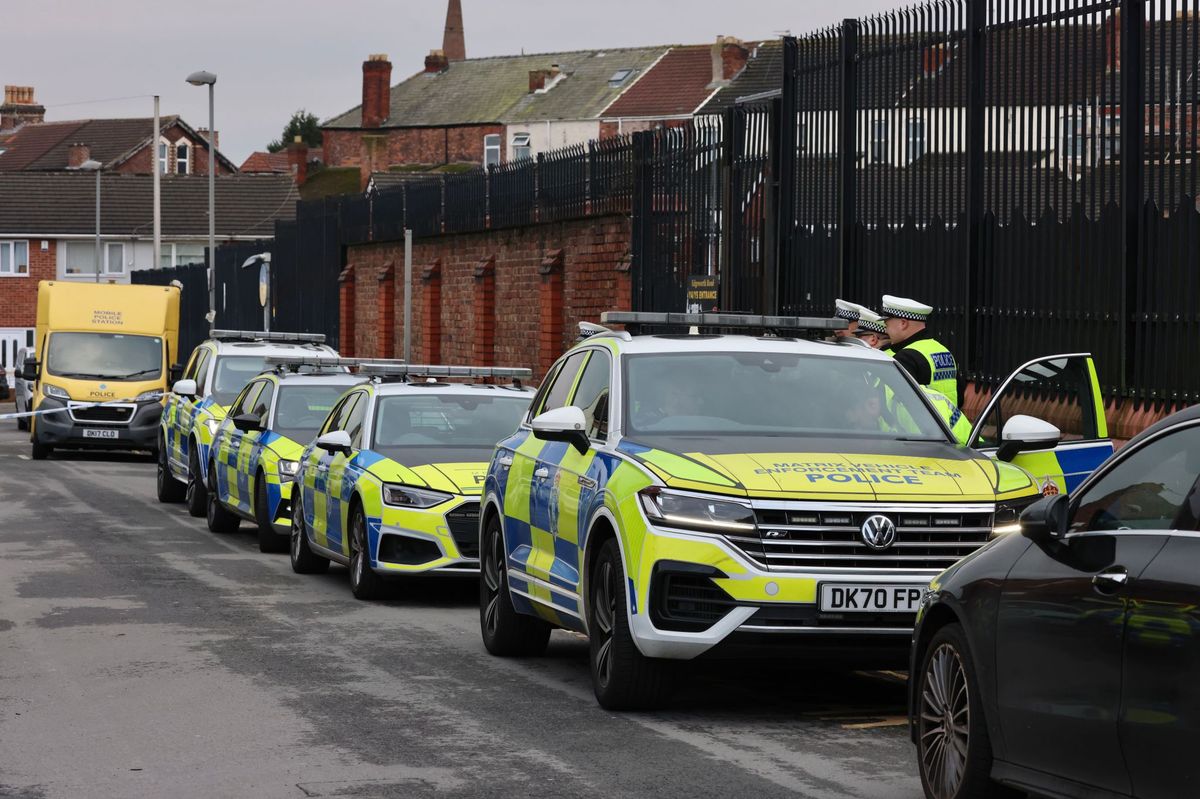 Police at the scene on Douglas Road in Anfield