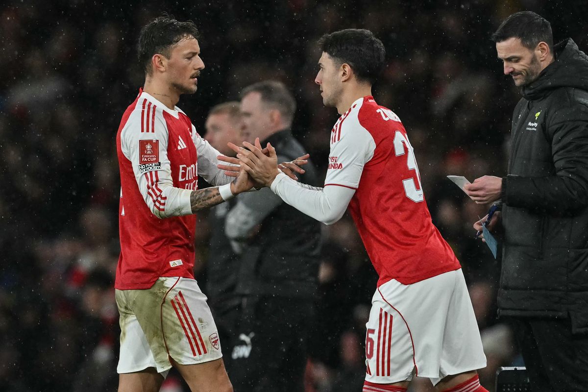 Ben White (L) is substituted out for Arsenal's Spanish defender #36 Martin Zubimendi