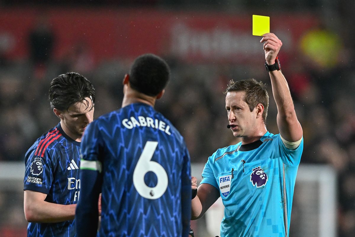 Gabriel Magalhaes is shown a yellow card during Arsenal's draw at Brentford