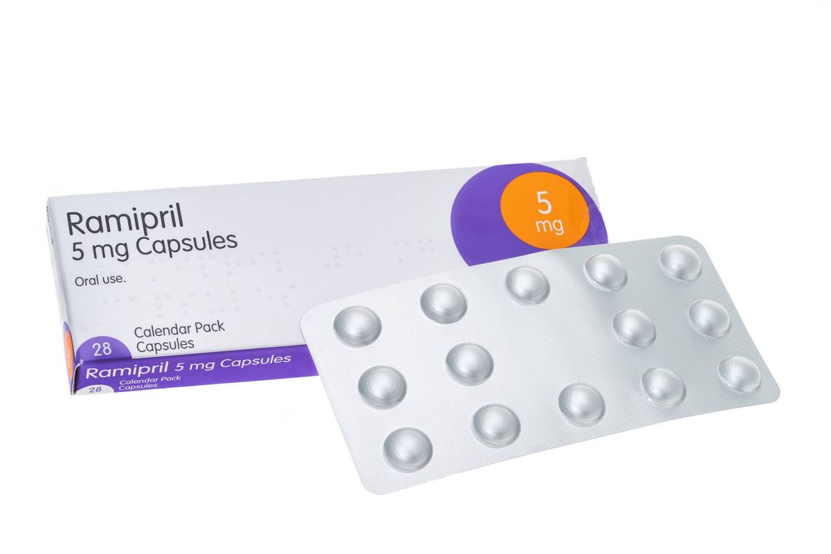 A close-up image of a blister pack containing medication, labeled "Rompril 5 mg Capsules." The blister pack is white and purple, with individual capsules visible inside. The medication is likely for the treatment of hypertension.