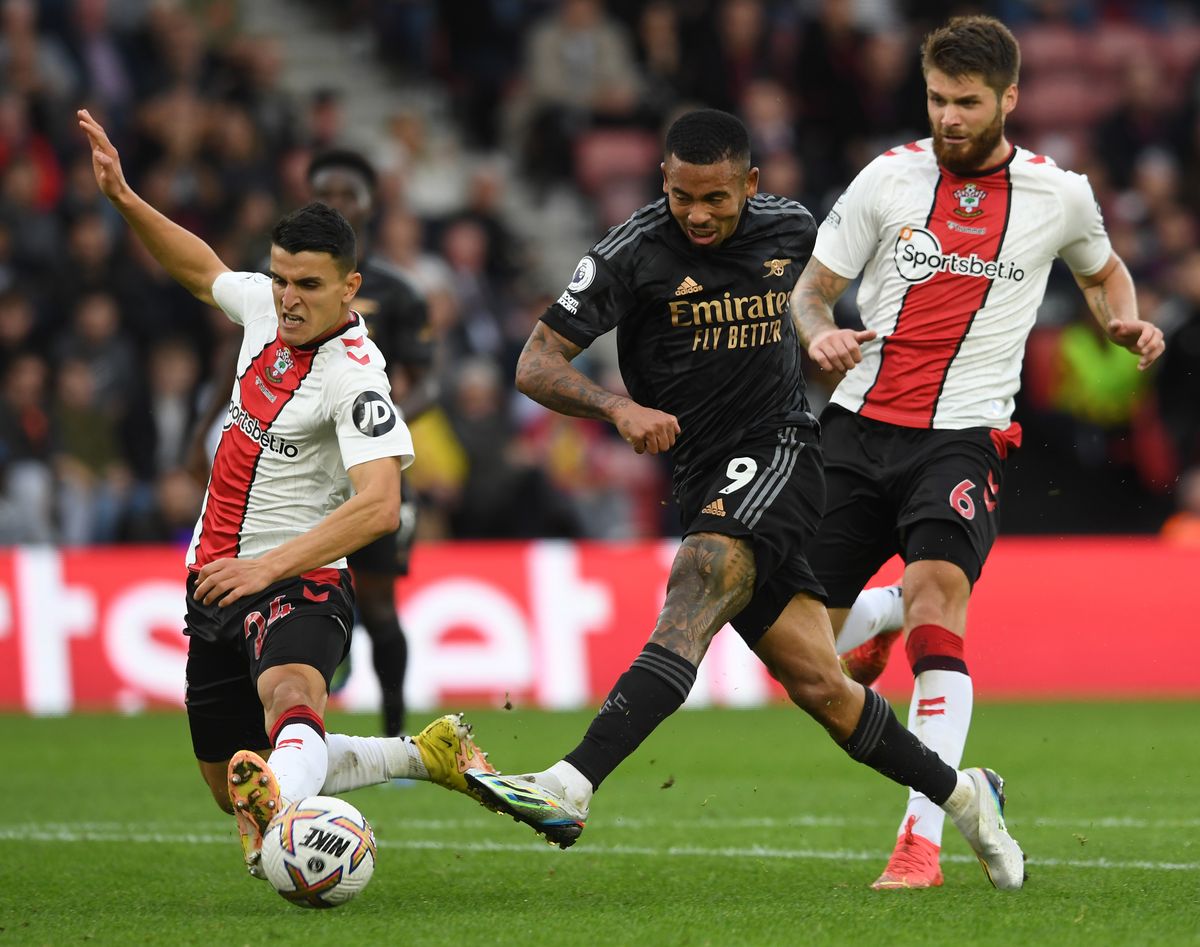 Gabriel Jesus of Arsenal under pressure from Mohammed Elyounoussi and Duje Caleta-Car