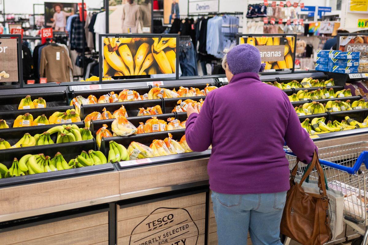 A woman in the Tesco fruit section