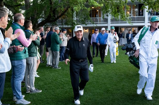 Gary Player walks from the clubhouse.