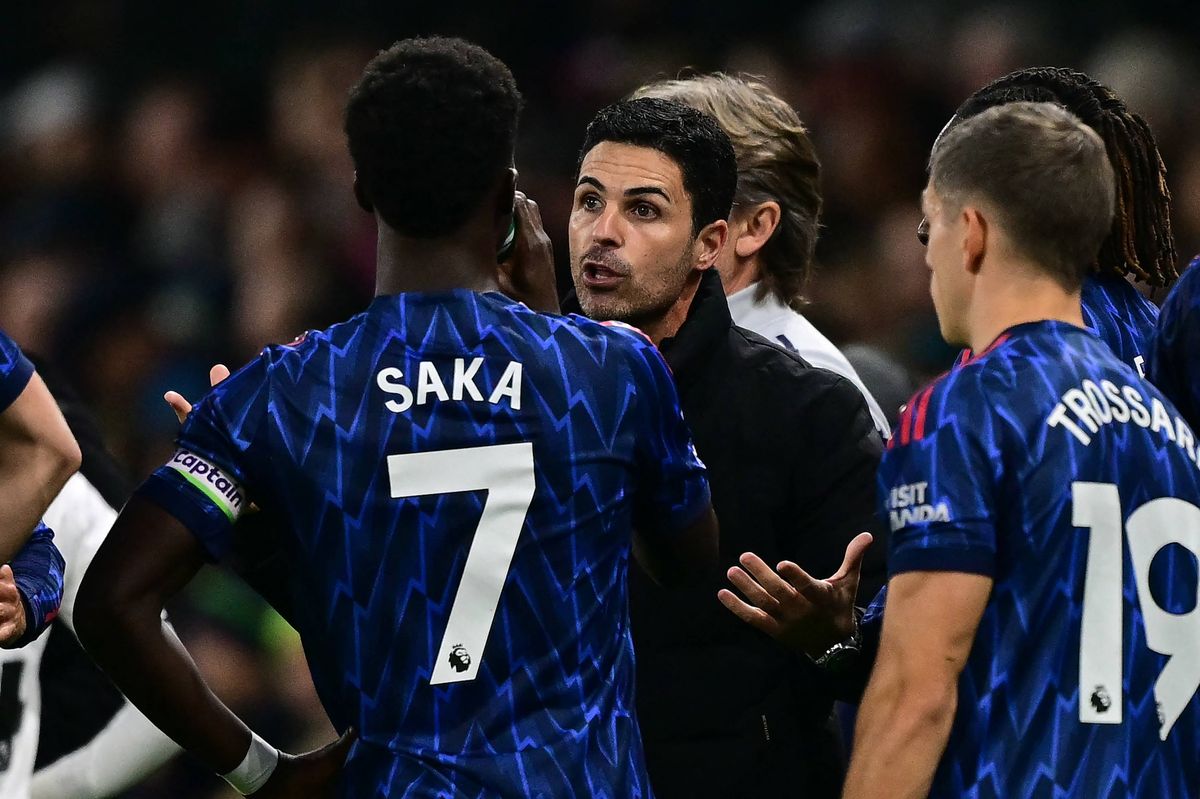 Mikel Arteta and Bukayo Saka