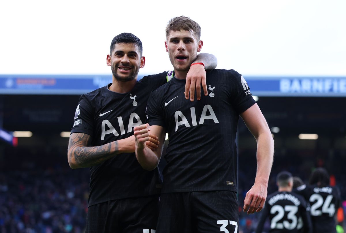 Micky van de Ven of Tottenham Hotspur celebrates scoring his team's first goal with teammate Cristian Romero during the Premier League match between Burnley and Tottenham Hotspur at Turf Moor on January 24, 2026 in Burnley, England