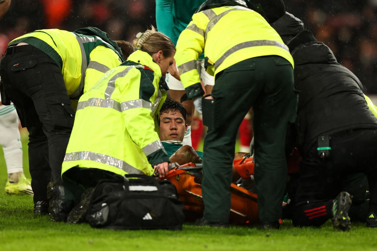SUNDERLAND, ENGLAND - FEBRUARY 11: Liverpool's Wataru Endo receives treatment to his leg during the Premier League match between Sunderland and Liverpool at Stadium of Light on February 11, 2026 in Sunderland, United Kingdom. (Photo by Alex Dodd - CameraSport via Getty Images)
