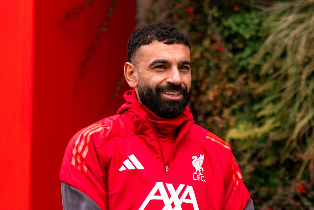 Mohamed Salah emerges before a Liverpool training session.