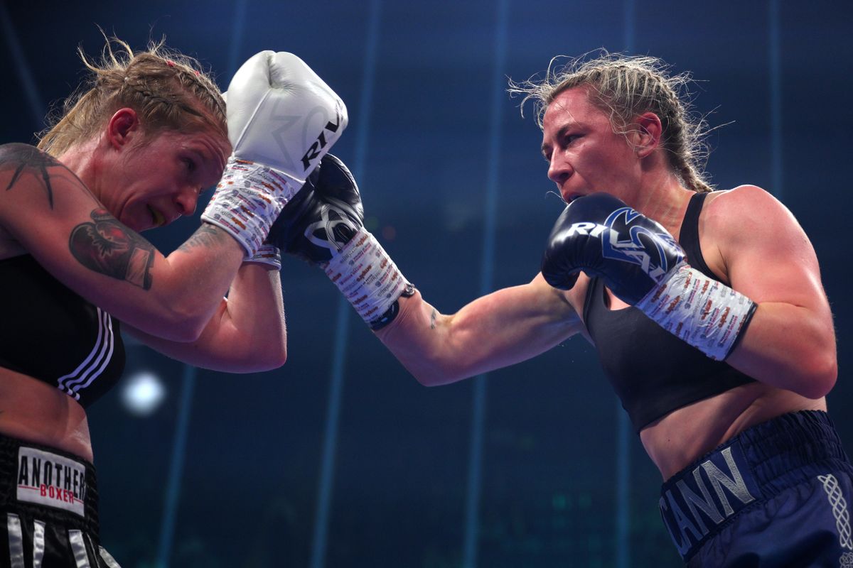 Molly McCann punches Beata Dudek during their fight on Saturday night