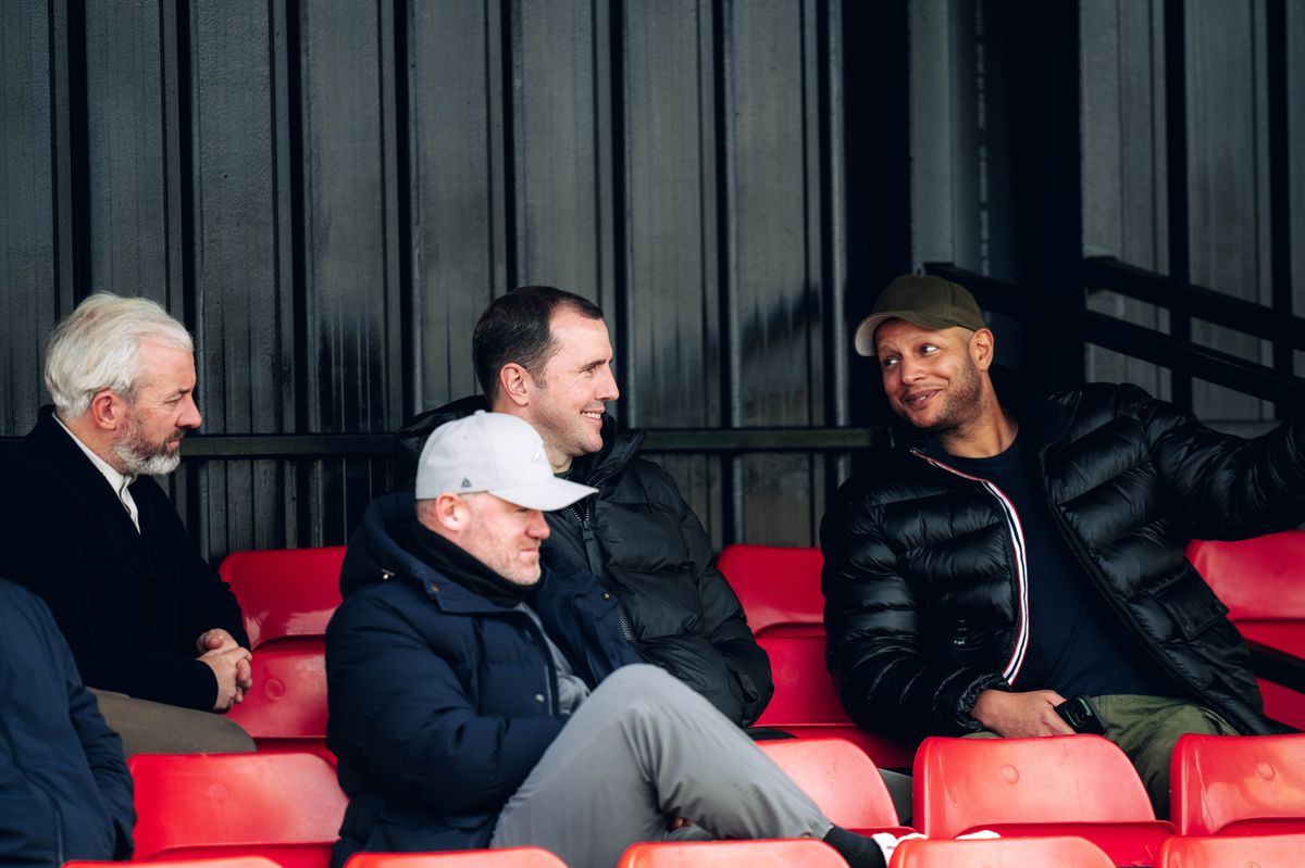 Wayne Rooney and John O'Shea watch Manchester United under-18s taken on Derby County