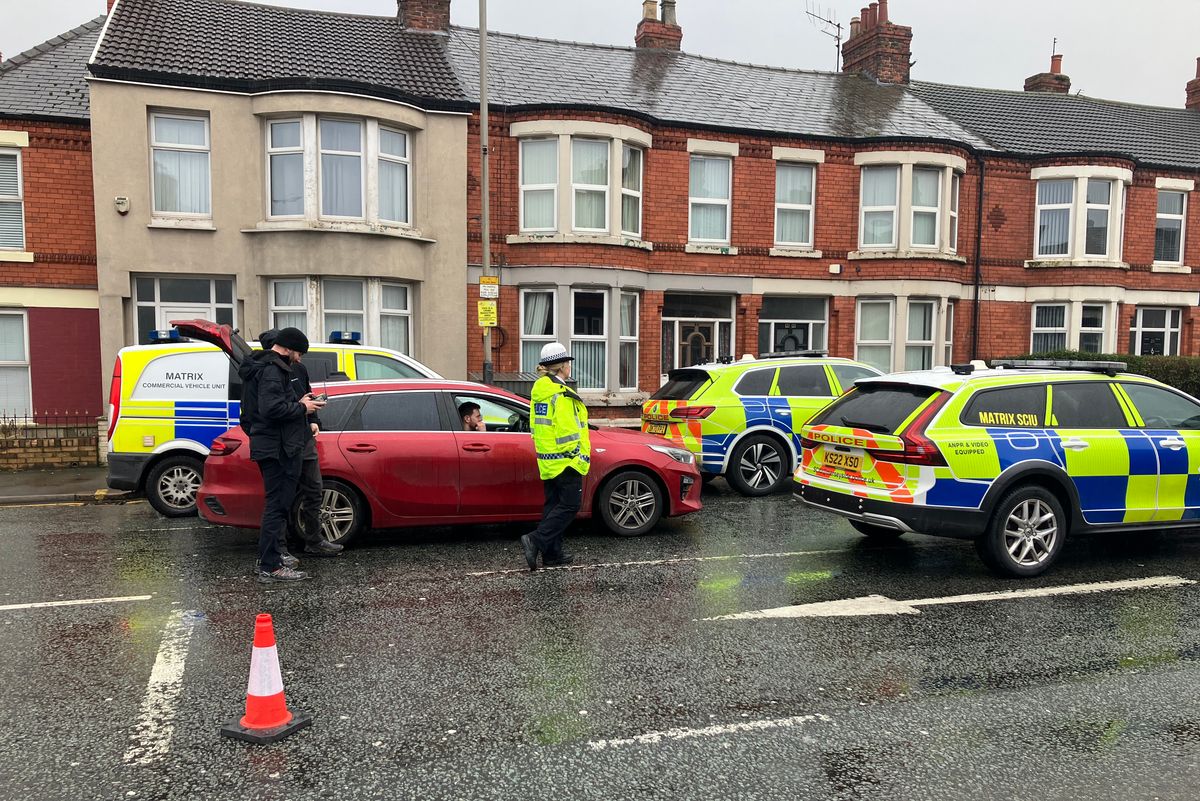 Police and drone operators on Walton Hall Avenue