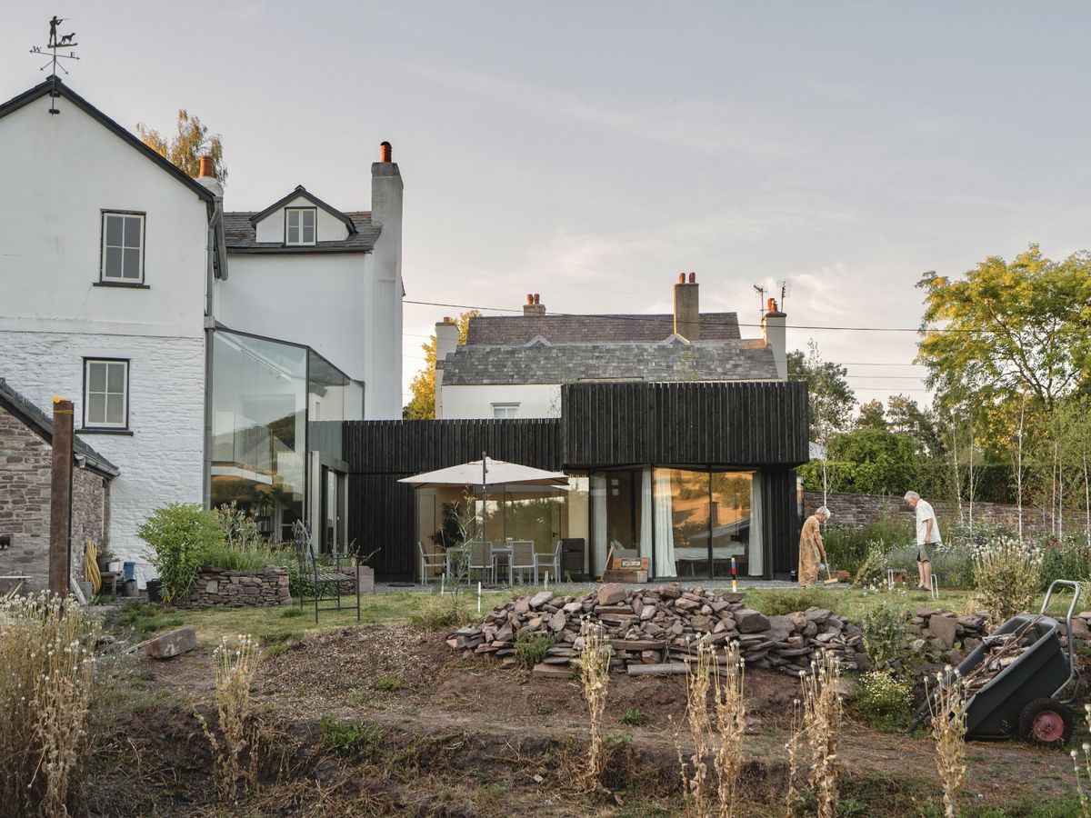 New single-storey black clad extension to Grade II listed Alma House Six projects shortlisted for RSAW Welsh Architecture Awards 2026 