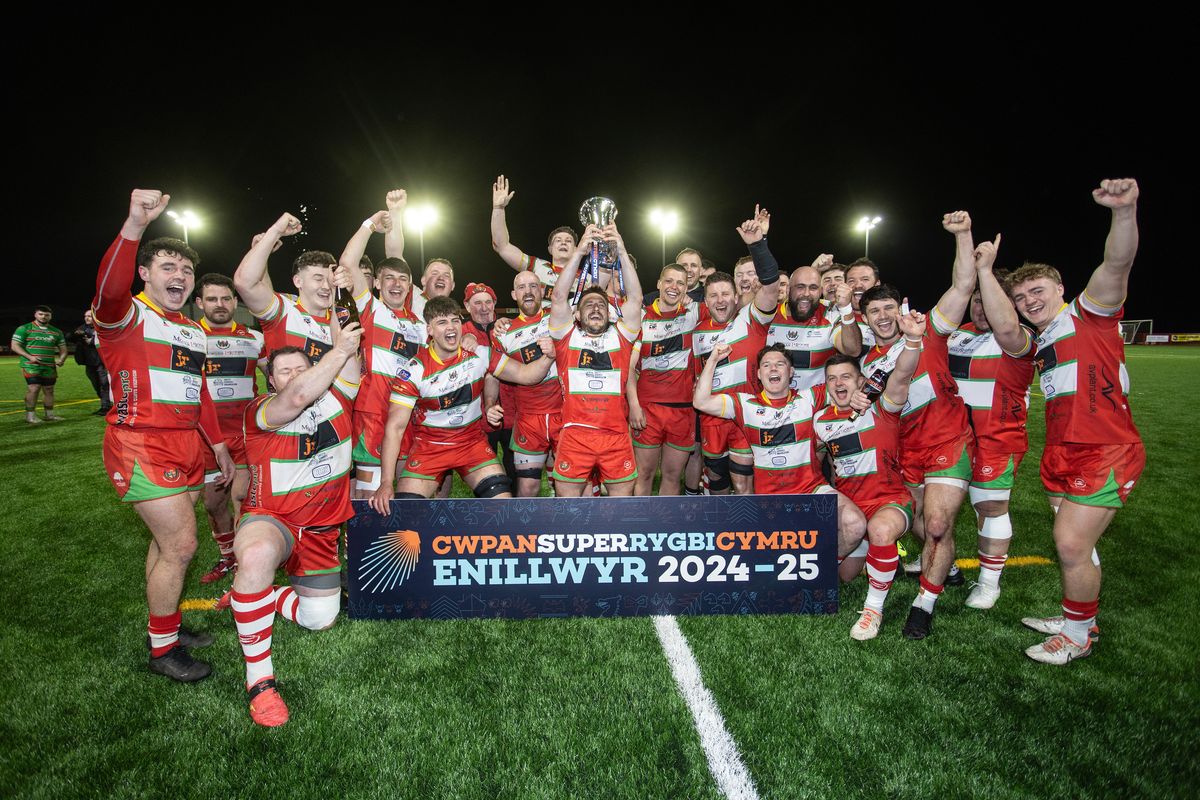 Captain Lee Rees and Llandovery team-mates lift the Super Rygbi Cymru trophy last year