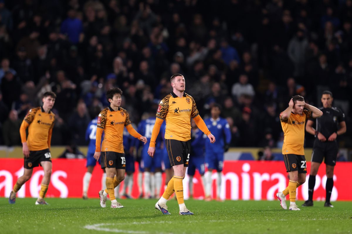 John Lundstram looks on after Chelsea scored their fourth goal against Hull City