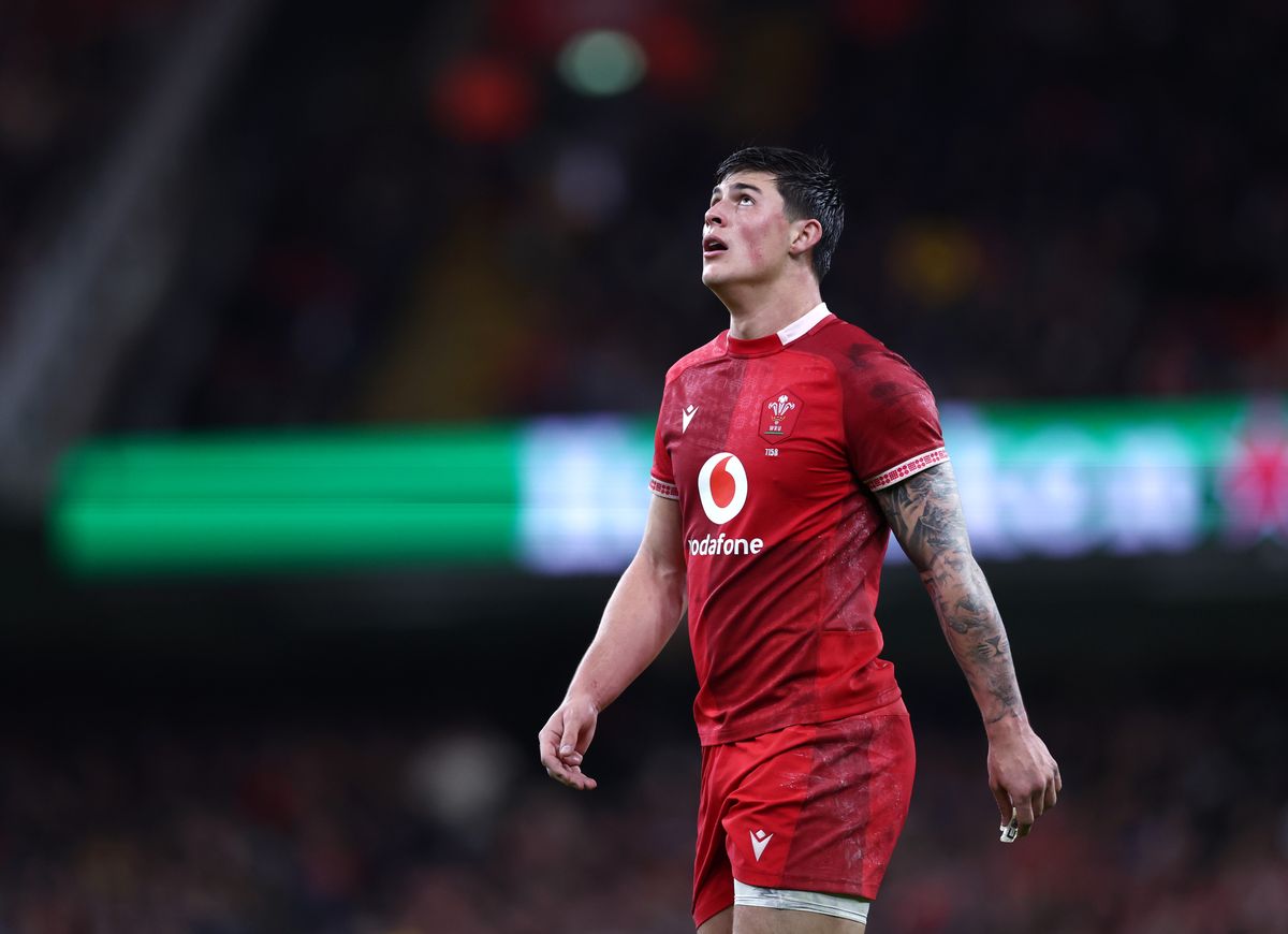 Louis Rees-Zammit of Wales looks dejected